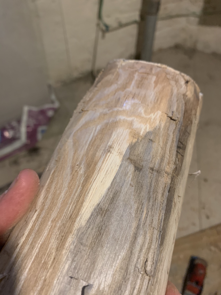 log with about 4 inches roughly planed